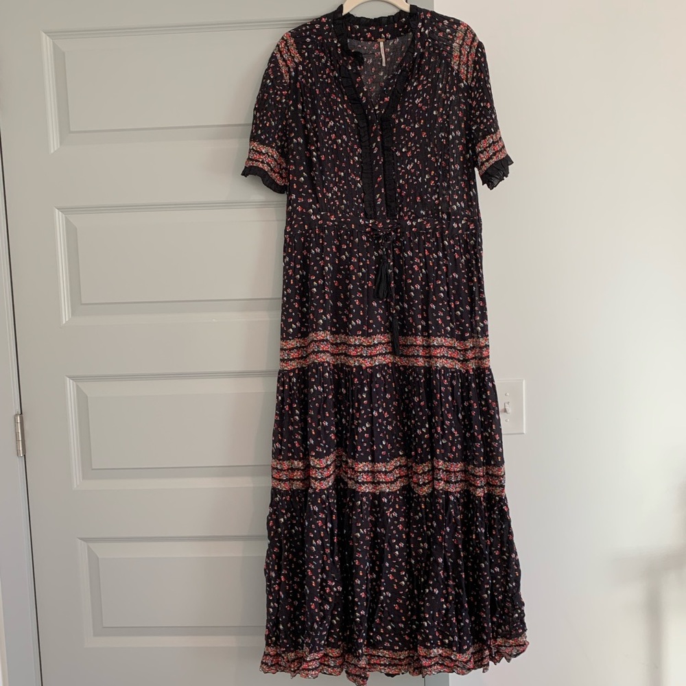 Free People black maxi dress with multicolored flowers. Size small.